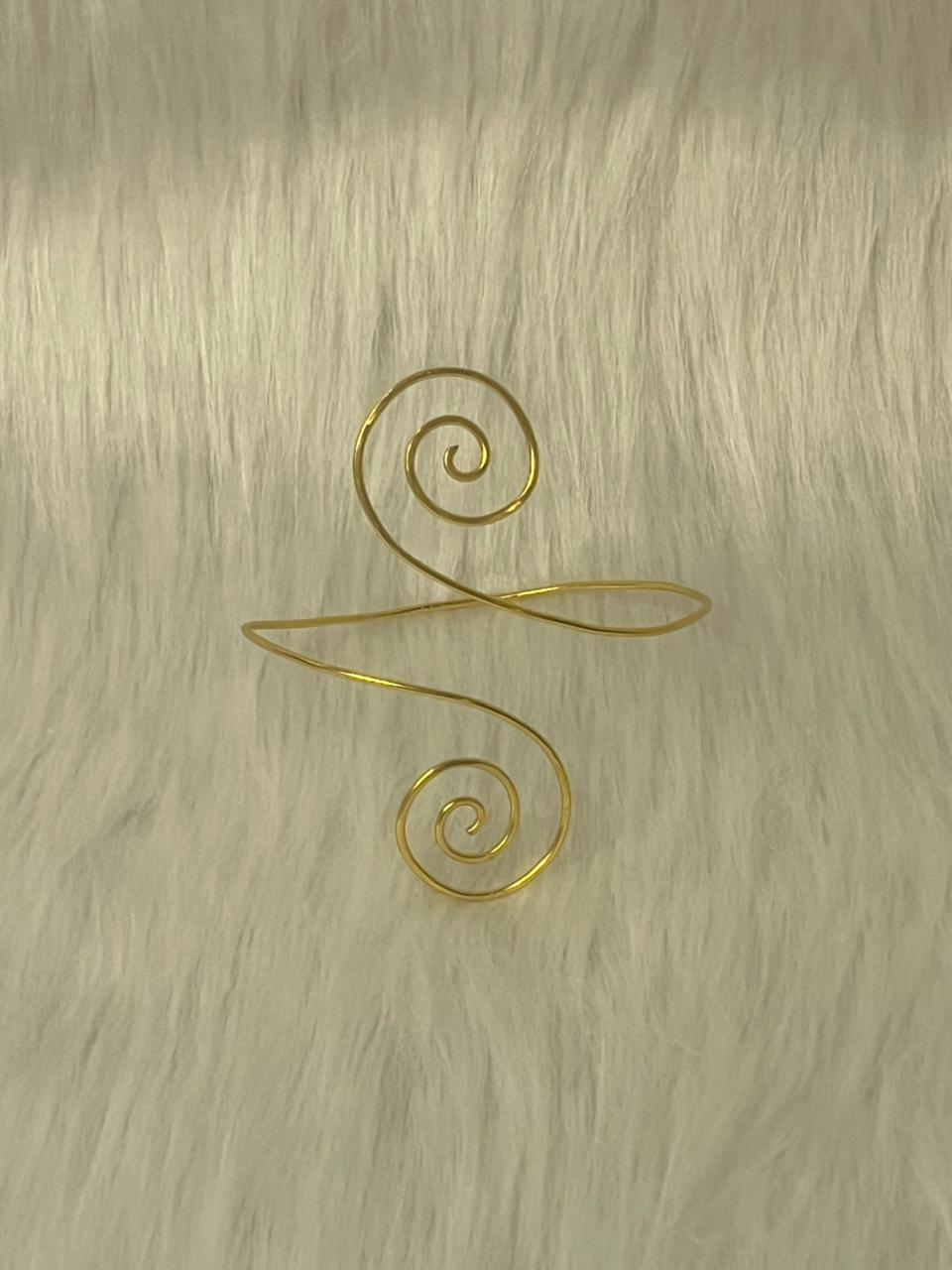Swirly armcuff