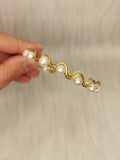 Pearl ripple brass bracelet